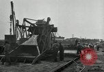 Image of Road construction United States USA, 1930, second 36 stock footage video 65675031956