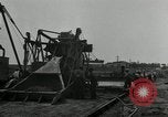 Image of Road construction United States USA, 1930, second 40 stock footage video 65675031956