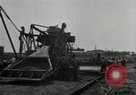Image of Road construction United States USA, 1930, second 41 stock footage video 65675031956