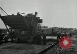 Image of Road construction United States USA, 1930, second 45 stock footage video 65675031956