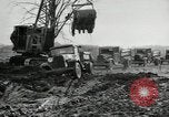 Image of road construction United States USA, 1930, second 24 stock footage video 65675031957