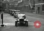 Image of Motorcade for Model T Fifteen Millionth car Highland Park Michigan USA, 1927, second 16 stock footage video 65675031961