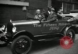 Image of Motorcade for Model T Fifteen Millionth car Highland Park Michigan USA, 1927, second 52 stock footage video 65675031961