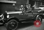 Image of Motorcade for Model T Fifteen Millionth car Highland Park Michigan USA, 1927, second 53 stock footage video 65675031961