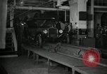 Image of Workers with Model T Fifteen Millionth car Highland Park Michigan USA, 1927, second 1 stock footage video 65675031962