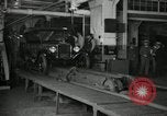 Image of Workers with Model T Fifteen Millionth car Highland Park Michigan USA, 1927, second 3 stock footage video 65675031962