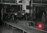 Image of Workers with Model T Fifteen Millionth car Highland Park Michigan USA, 1927, second 5 stock footage video 65675031962