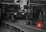 Image of Workers with Model T Fifteen Millionth car Highland Park Michigan USA, 1927, second 6 stock footage video 65675031962