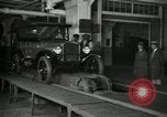 Image of Workers with Model T Fifteen Millionth car Highland Park Michigan USA, 1927, second 7 stock footage video 65675031962