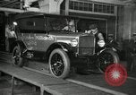 Image of Workers with Model T Fifteen Millionth car Highland Park Michigan USA, 1927, second 11 stock footage video 65675031962