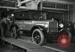 Image of Workers with Model T Fifteen Millionth car Highland Park Michigan USA, 1927, second 13 stock footage video 65675031962