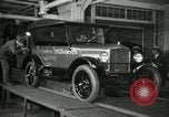 Image of Workers with Model T Fifteen Millionth car Highland Park Michigan USA, 1927, second 14 stock footage video 65675031962