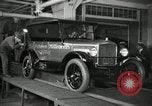 Image of Workers with Model T Fifteen Millionth car Highland Park Michigan USA, 1927, second 15 stock footage video 65675031962