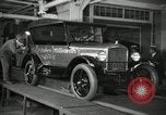 Image of Workers with Model T Fifteen Millionth car Highland Park Michigan USA, 1927, second 16 stock footage video 65675031962