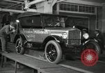 Image of Workers with Model T Fifteen Millionth car Highland Park Michigan USA, 1927, second 18 stock footage video 65675031962