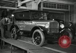 Image of Workers with Model T Fifteen Millionth car Highland Park Michigan USA, 1927, second 19 stock footage video 65675031962