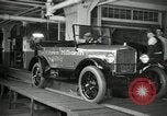 Image of Workers with Model T Fifteen Millionth car Highland Park Michigan USA, 1927, second 20 stock footage video 65675031962
