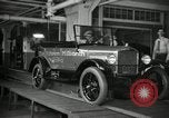 Image of Workers with Model T Fifteen Millionth car Highland Park Michigan USA, 1927, second 22 stock footage video 65675031962