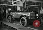 Image of Workers with Model T Fifteen Millionth car Highland Park Michigan USA, 1927, second 23 stock footage video 65675031962