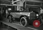 Image of Workers with Model T Fifteen Millionth car Highland Park Michigan USA, 1927, second 24 stock footage video 65675031962