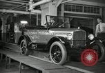 Image of Workers with Model T Fifteen Millionth car Highland Park Michigan USA, 1927, second 25 stock footage video 65675031962
