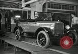 Image of Workers with Model T Fifteen Millionth car Highland Park Michigan USA, 1927, second 26 stock footage video 65675031962