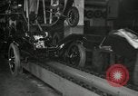 Image of Workers with Model T Fifteen Millionth car Highland Park Michigan USA, 1927, second 48 stock footage video 65675031962