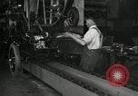 Image of Workers with Model T Fifteen Millionth car Highland Park Michigan USA, 1927, second 49 stock footage video 65675031962