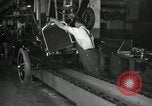 Image of Workers with Model T Fifteen Millionth car Highland Park Michigan USA, 1927, second 51 stock footage video 65675031962