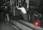 Image of Workers with Model T Fifteen Millionth car Highland Park Michigan USA, 1927, second 53 stock footage video 65675031962