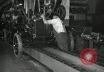 Image of Workers with Model T Fifteen Millionth car Highland Park Michigan USA, 1927, second 54 stock footage video 65675031962