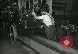 Image of Workers with Model T Fifteen Millionth car Highland Park Michigan USA, 1927, second 55 stock footage video 65675031962