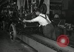 Image of Workers with Model T Fifteen Millionth car Highland Park Michigan USA, 1927, second 56 stock footage video 65675031962