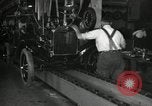 Image of Workers with Model T Fifteen Millionth car Highland Park Michigan USA, 1927, second 57 stock footage video 65675031962