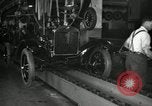 Image of Workers with Model T Fifteen Millionth car Highland Park Michigan USA, 1927, second 58 stock footage video 65675031962