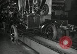 Image of Workers with Model T Fifteen Millionth car Highland Park Michigan USA, 1927, second 59 stock footage video 65675031962