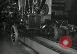Image of Workers with Model T Fifteen Millionth car Highland Park Michigan USA, 1927, second 62 stock footage video 65675031962