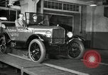 Image of Edsel Ford with Model T Fifteen Millionth car Highland Park Michigan USA, 1927, second 40 stock footage video 65675031963