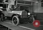 Image of Edsel Ford with Model T Fifteen Millionth car Highland Park Michigan USA, 1927, second 45 stock footage video 65675031963