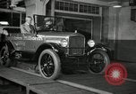 Image of Edsel Ford with Model T Fifteen Millionth car Highland Park Michigan USA, 1927, second 46 stock footage video 65675031963