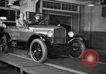 Image of Edsel Ford with Model T Fifteen Millionth car Highland Park Michigan USA, 1927, second 50 stock footage video 65675031963