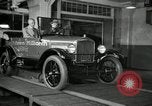 Image of Edsel Ford with Model T Fifteen Millionth car Highland Park Michigan USA, 1927, second 51 stock footage video 65675031963