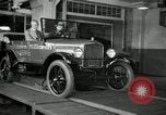 Image of Edsel Ford with Model T Fifteen Millionth car Highland Park Michigan USA, 1927, second 52 stock footage video 65675031963