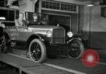 Image of Edsel Ford with Model T Fifteen Millionth car Highland Park Michigan USA, 1927, second 53 stock footage video 65675031963