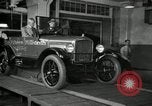 Image of Edsel Ford with Model T Fifteen Millionth car Highland Park Michigan USA, 1927, second 55 stock footage video 65675031963