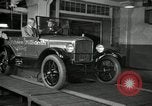 Image of Edsel Ford with Model T Fifteen Millionth car Highland Park Michigan USA, 1927, second 56 stock footage video 65675031963