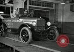 Image of Edsel Ford with Model T Fifteen Millionth car Highland Park Michigan USA, 1927, second 58 stock footage video 65675031963