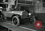 Image of Edsel Ford with Model T Fifteen Millionth car Highland Park Michigan USA, 1927, second 59 stock footage video 65675031963