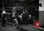 Image of Body assembly of Model T Fifteen Millionth car Highland Park Michigan USA, 1927, second 17 stock footage video 65675031966