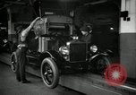 Image of Body assembly of Model T Fifteen Millionth car Highland Park Michigan USA, 1927, second 19 stock footage video 65675031966